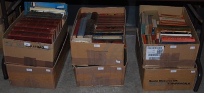 Lot 587 - Six boxes of assorted books to include the...