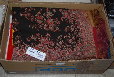 Lot 597 - A black ground Paisley pattern shawl together...