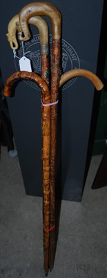 Lot 655 - Two vintage horn-handled walking canes,...