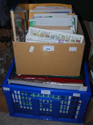 Lot 669 - Two boxes containing assorted first day covers...