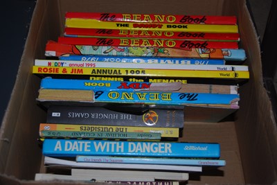 Lot 672 - A box of assorted childrens books and annuals.