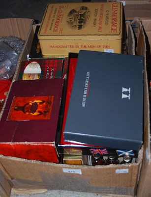 Lot 673 - A box containing various assorted whisky...