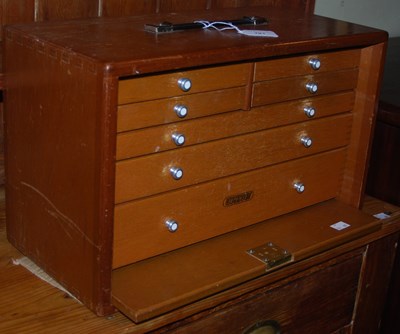 Lot 791 - A mid-century Union collectors cabinet, the...