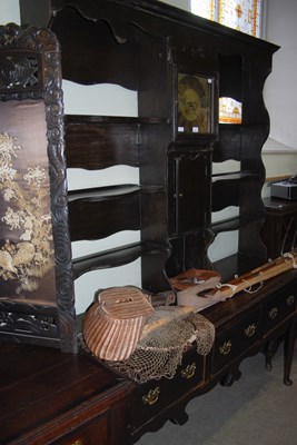 Lot 804 - A George III style oak two-part clock dresser,...