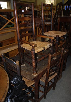 Lot 820 - An antique oak refectory table raised on four...