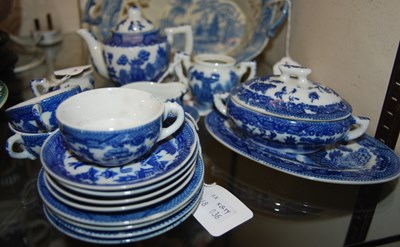 Lot 257 - A 20th century blue printed willow pattern...