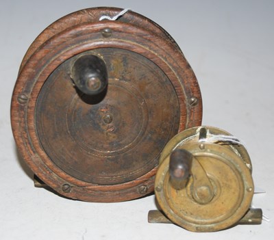 Lot 239 - Fishing Interest - a vintage wood and brass...