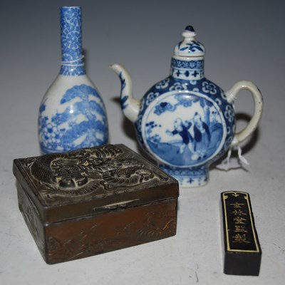 Lot 267 - A Chinese blue and white porcelain moon-shaped...