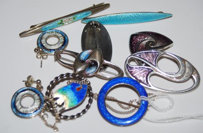 Lot 295 - A collection of silver and white enamel...