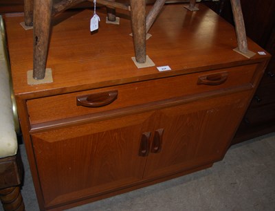 Lot 834 - A mid-century G-Plan teak side cabinet with...