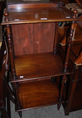 Lot 840 - A mahogany three tier whatnot.