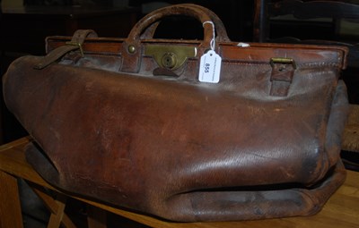 Lot 855 - A vintage brown leather gladstone / doctors bag.