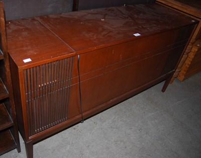 Lot 859 - A mid-century music cabinet containing a...