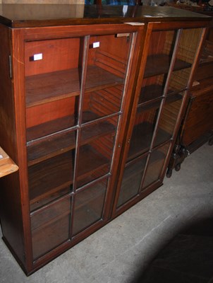 Lot 863 - A 20th century mahogany astragal glazed twin...