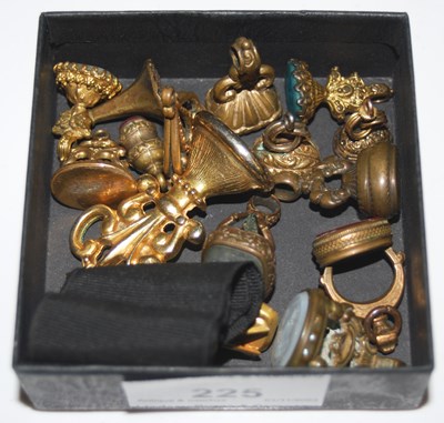 Lot 225 - A collection of assorted yellow metal fobs to...