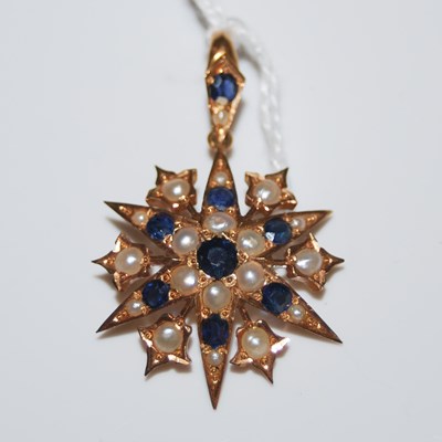 Lot 83 - A late 19th century yellow metal, split pearl...