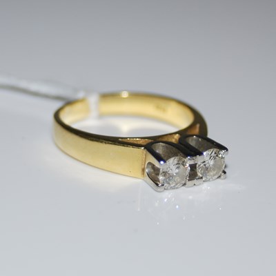 Lot 88 - A mid-20th century yellow and white metal two...