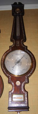 Lot 702 - A 19th century rosewood and mother of pearl...