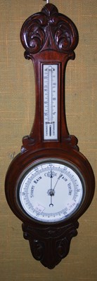 Lot 700 - A late 19th century mahogany barometer with...