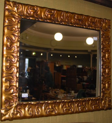 Lot 704 - A gilt framed rectangular wall mirror with...