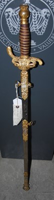 Lot 660 - A 20th century fraternal type sword, the brass...
