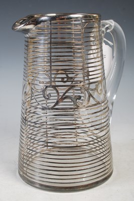 Lot 123 - An early 20th century white metal overlaid...