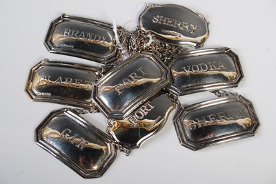 Lot 127 - A collection of eight assorted spirit labels...