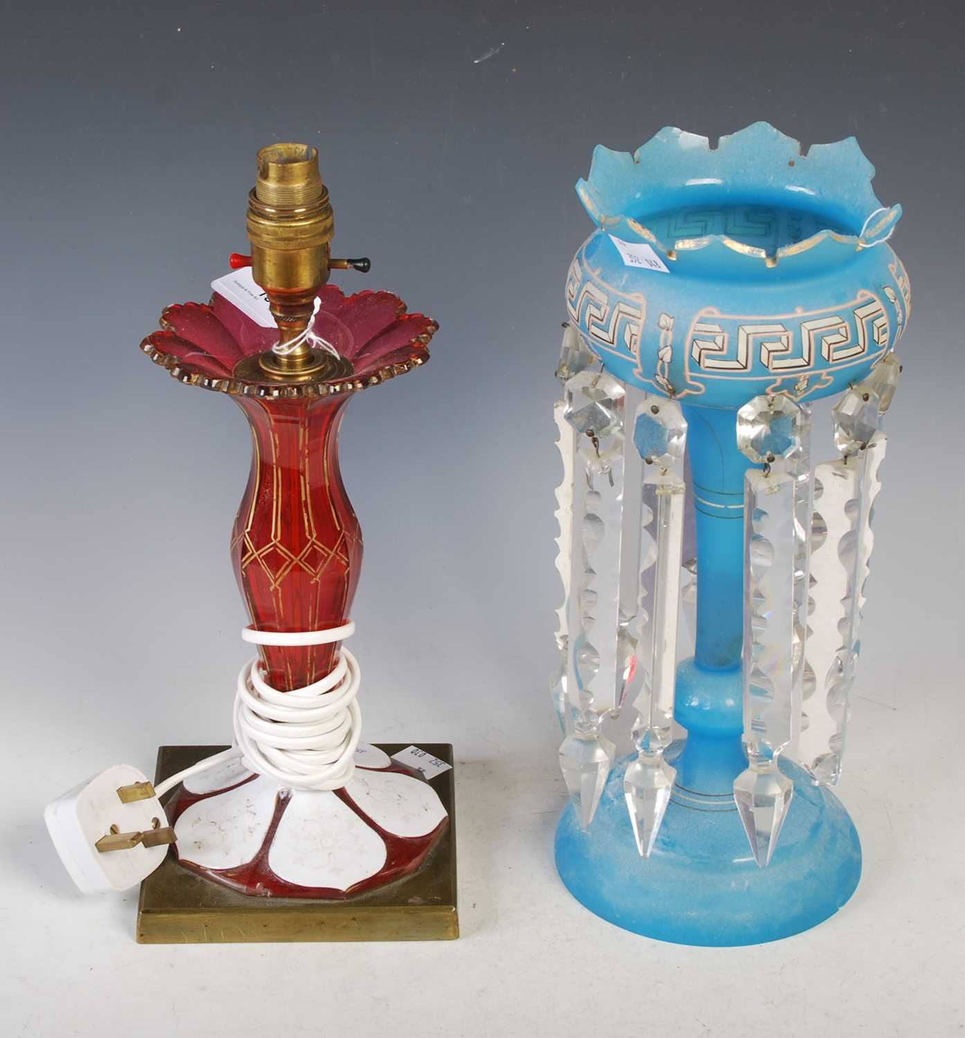 Lot 13 - A late 19th century opaque white overlaid ruby...