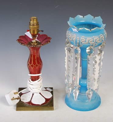 Lot 13 - A late 19th century opaque white overlaid ruby...
