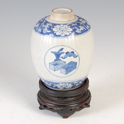 Lot 517 - A Chinese porcelain blue and white jar, Qing...