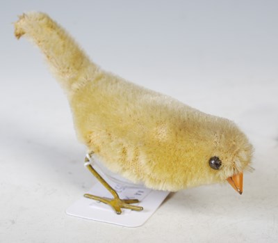 Lot 110 - Two clockwork bird toys and a seal toy.