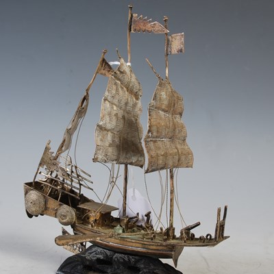 Lot 181 - A Chinese white metal model of a three-masted...