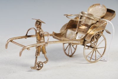 Lot 181 - A Chinese white metal model of a three-masted...