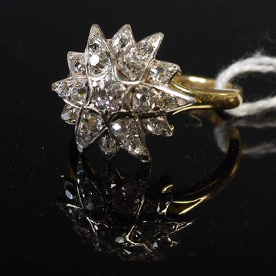 Lot 41 - An 18ct yellow gold, silver and diamond set...