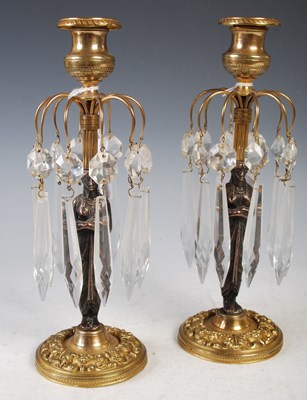 Lot 39 - A pair of 19th century Regency style gilt...