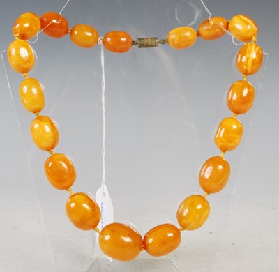 Lot 53 - A vintage butterscotch amber graduated bead...