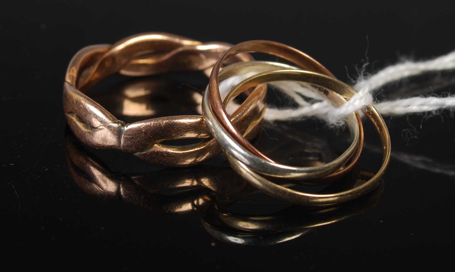 Lot 86 - A 9ct gold openwork ring, together with a...