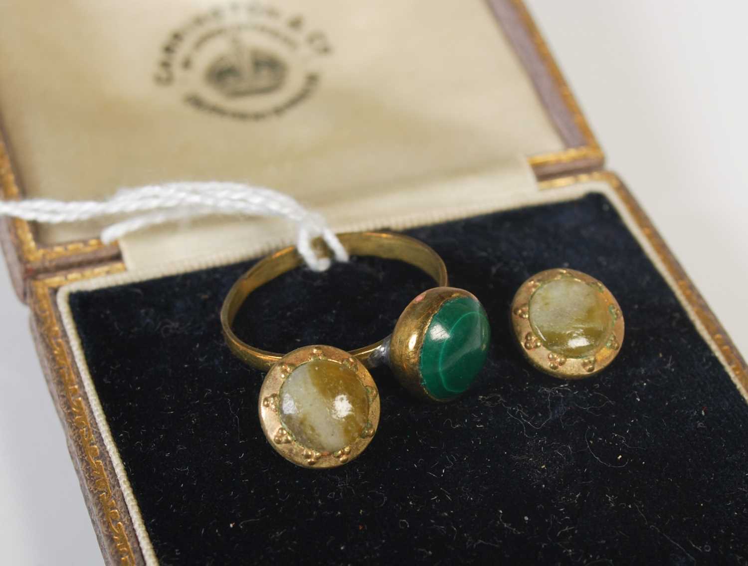 Lot 91 - A pair of yellow metal and onyx stud earrings,...
