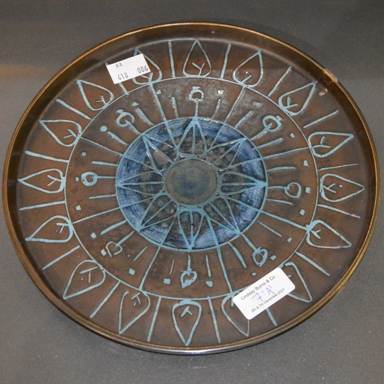 Lot 7 - A circular plate/ dish by Honour Curtis...