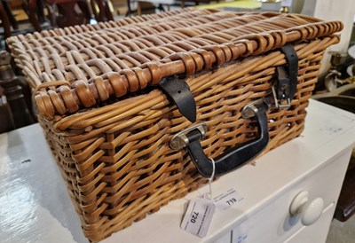 Lot 720 - A wicker picnic basket.