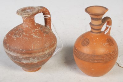 Lot 41 - An antique pottery Aryballos (Juglet) in black-...