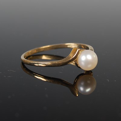 Lot 44 - A 9ct gold and pearl set ring, size 'P', gross...