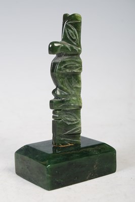 Lot 104 - A New Zealand carved pounamu, column 7.8cm...