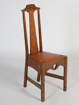 Lot 30 - An early 20th century oak Arts & Crafts side...