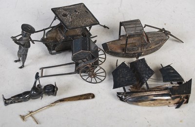 Lot 165 - A small collection of Chinese silver models to...
