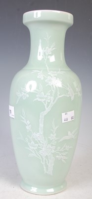 Lot 170 - A Chinese porcelain celadon ground vase, early...
