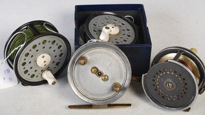 Lot 238 - Fishing interest: four assorted fishing reels...