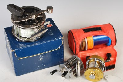 Lot 242 - Fishing interest: three assorted fishing reels...