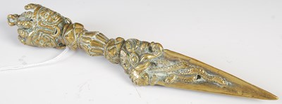 Lot 101A - An antique Tibetan brass ritual knife/ dagger,...