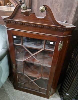 Lot 636 - A 19th century mahogany corner cupboard with...